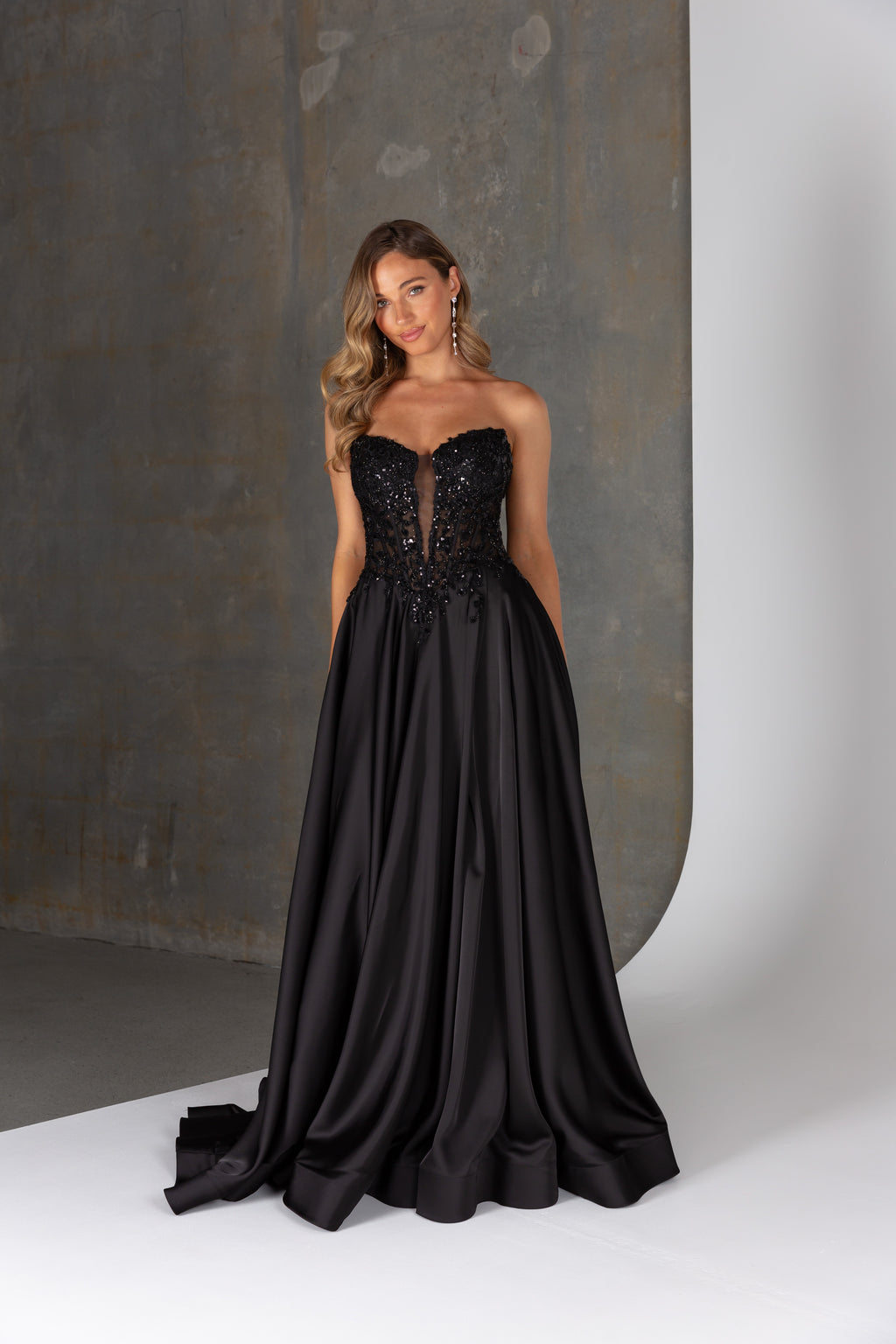Alpha formal dress by Tania Olsen – strapless satin gown with lace appliqué corset bodice, mesh insert, and high leg split.