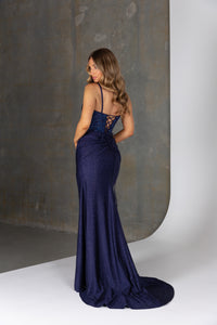 Back view of Echo PO25165 dress – lace-up back with scrunched bum detail, fitted silhouette, and glitter knit fabric.