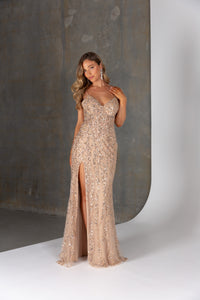 Nyx formal dress by Tania Olsen – beaded tulle fitted gown with illusion corset bodice and high leg split.