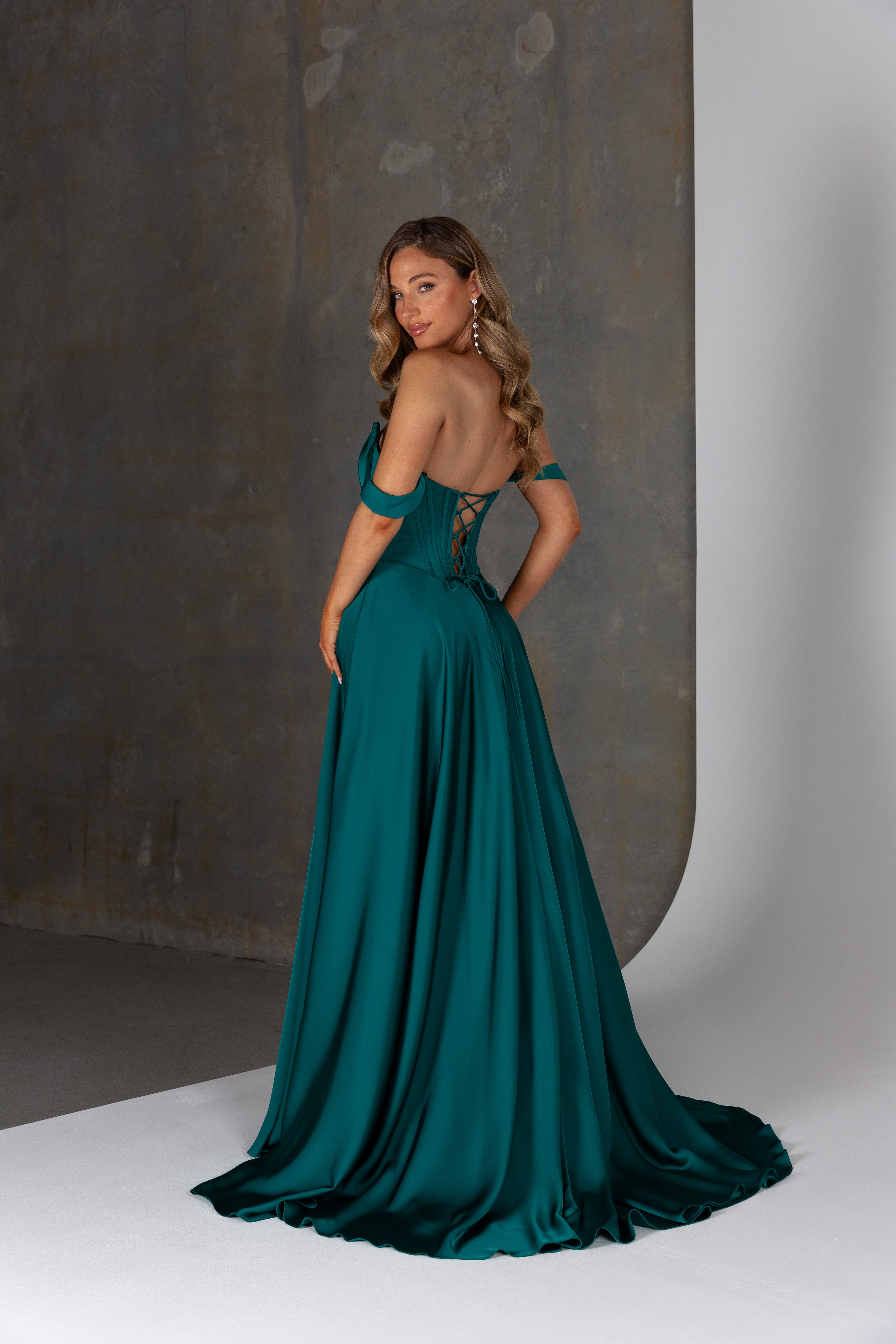 Back view of Solana dress – lace-up satin corset gown with invisible zipper and flowing skirt.