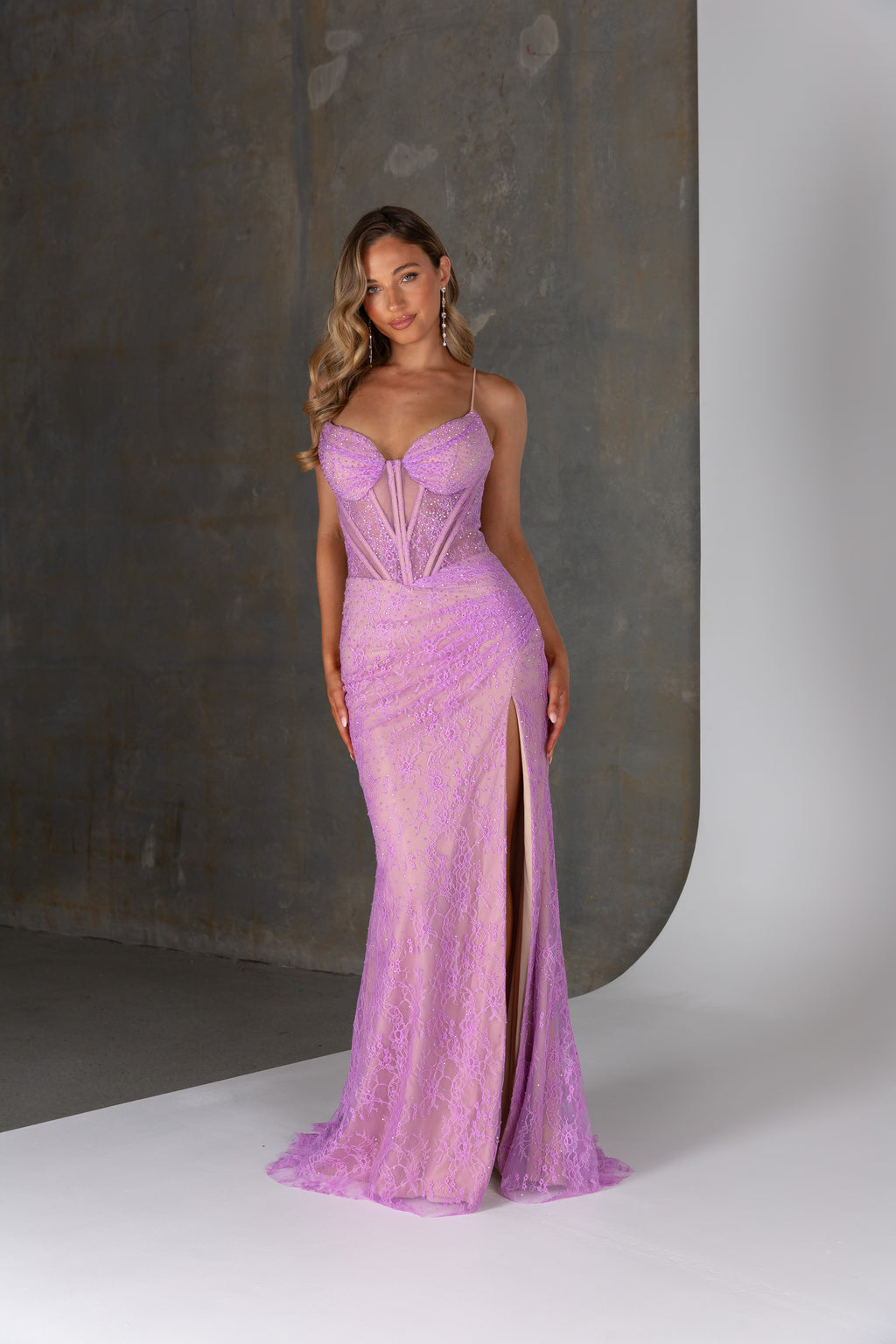 Zadie formal dress by Tania Olsen – Chantilly lace gown with illusion corset bodice, nude lining, and high leg split.